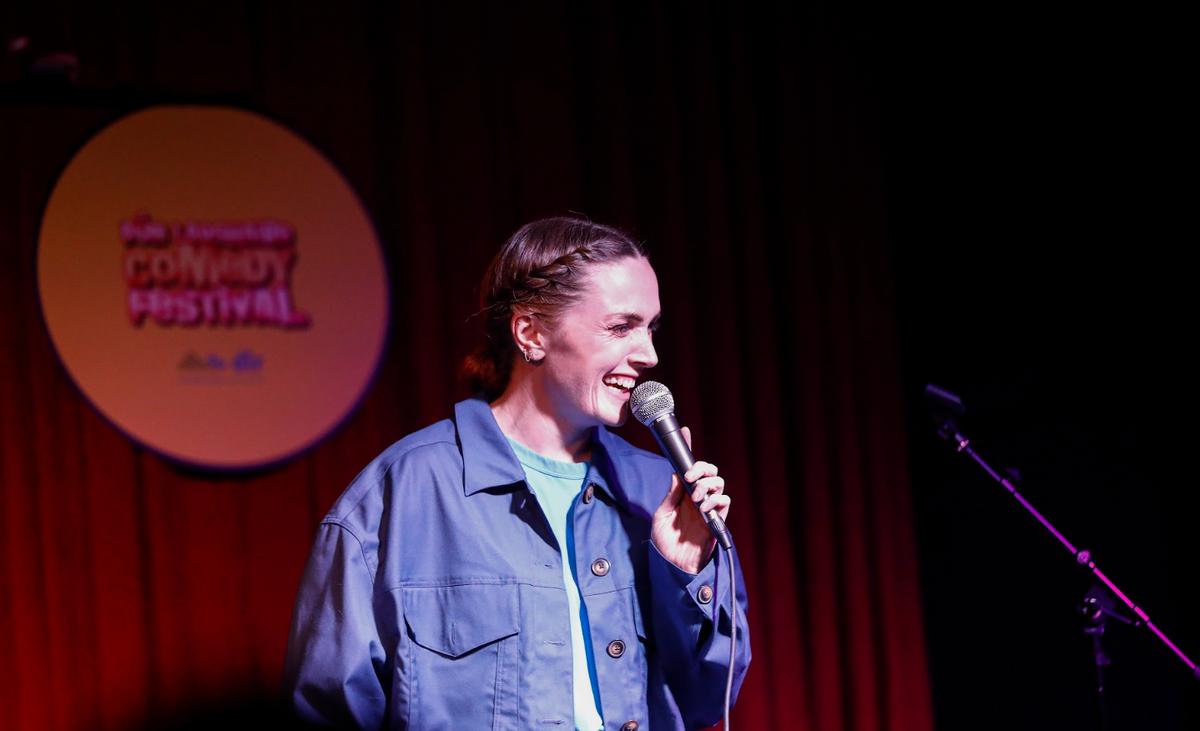 Comedian on stage at the festival